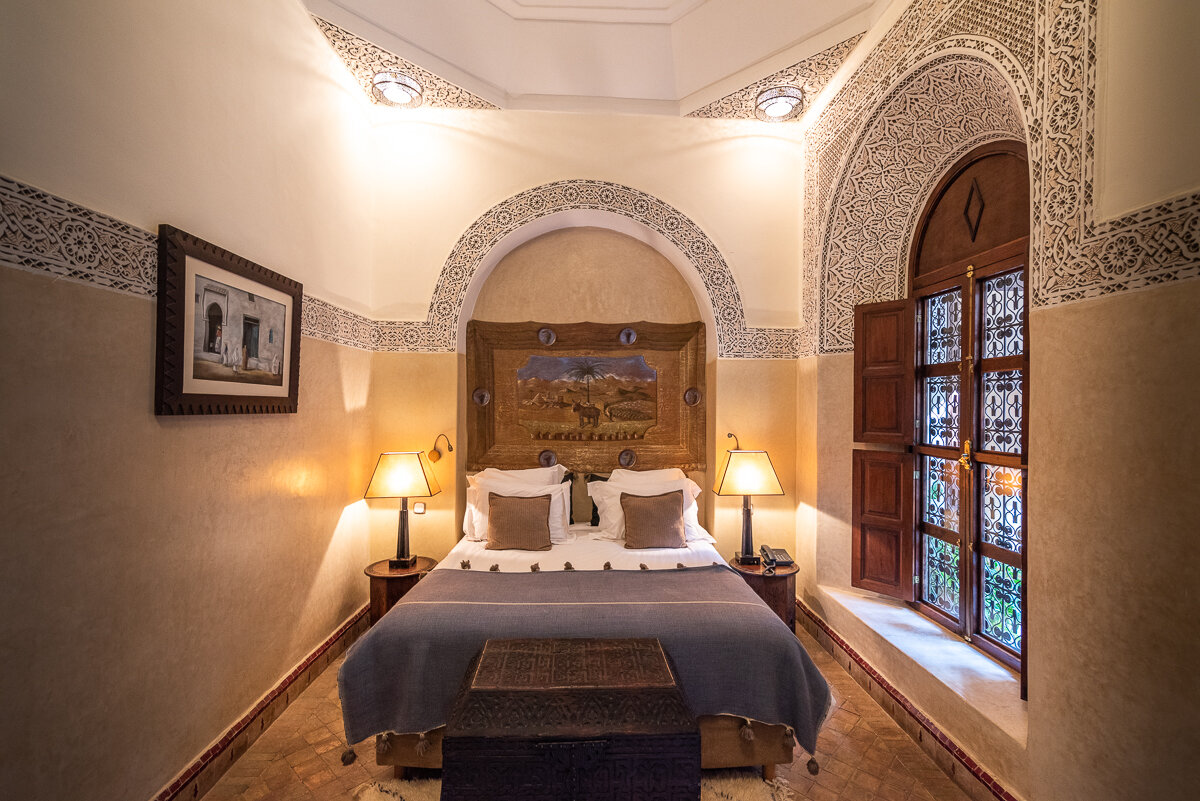 Lit dans une chambre de la Villa des Orangers à Marrakech