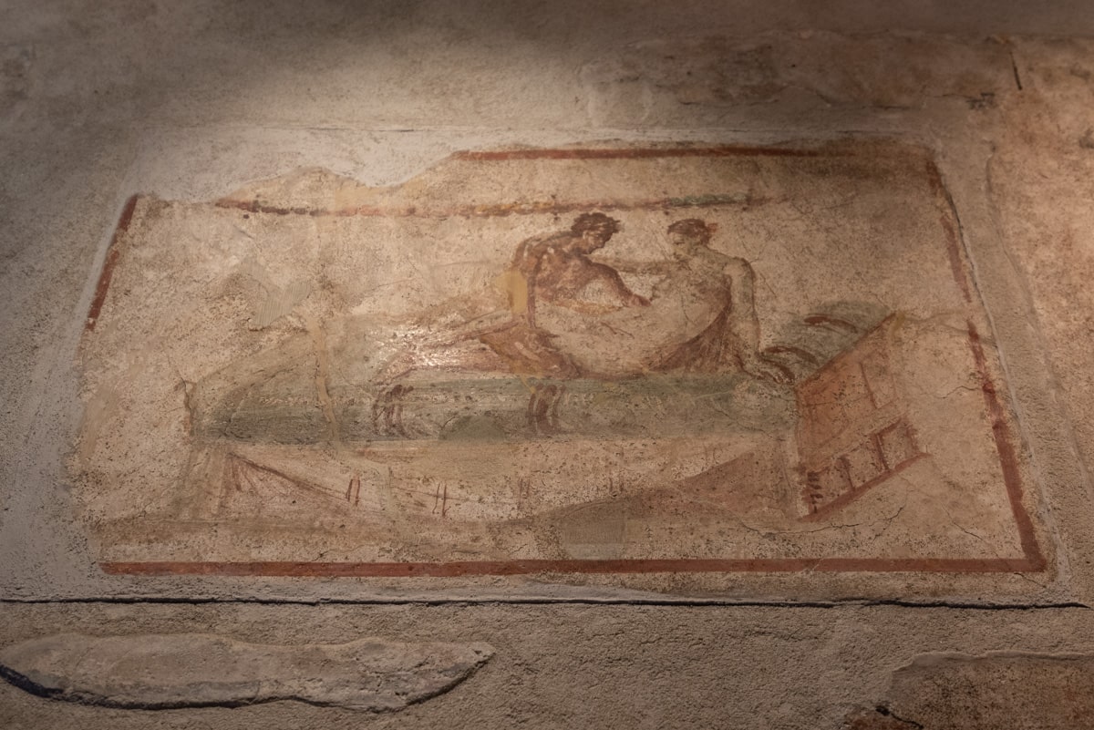 Fresque d'un couple au lit à Pompéi